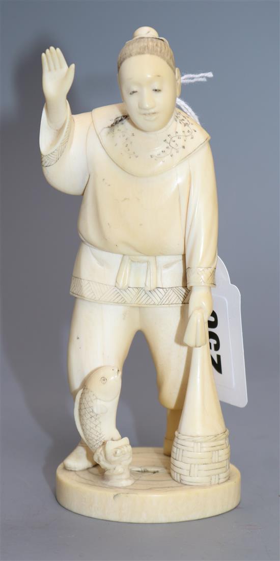 A Japanese ivory okimono of a fisherman